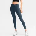 High-waisted dark teal yoga leggings with side pockets and elastic compression fit - XL / Grey Blue