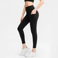 High-waisted black yoga pants with side pockets for sports and fitness support - XL / Black