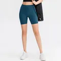 High-waisted teal yoga shorts with seamless front and brushed nude-feel fabric - 10/XL / Bottoms / Aqua Blue