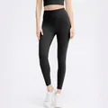 Women's high-waisted black yoga leggings in buttery soft elastic fabric for fitness - Black