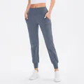 Women's high waist dark blue-grey yoga joggers with pockets and slimming vertical seams - S / Bottoms / Haze Blue