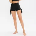 High-waisted black yoga shorts featuring adjustable side drawstrings and ruched details - 8/L / Bottoms / Black