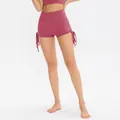 High-waisted dusty pink yoga shorts with adjustable side drawstrings and scrunch detail - Merlot Red