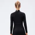 Slim fit black long sleeve yoga jacket with athletic stitching and stretch fabric - 8/L / Tops / Black