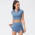 Women's blue two-piece tennis skirt set with V-neck crop top and elastic gym skort - 2/XS / Top And Bottom / Stone Blue