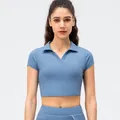 Short sleeve blue sports polo crop top for women in seamless high-stretch nylon fabric - 2/XS / Tops / Stone Blue