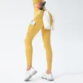 High-waist mustard yellow yoga leggings with side pockets and towel holder loop - S / Ginger Yellow