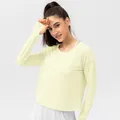 Women's UV protection sports long sleeve shirt in light yellow with thumb holes - 2/XS / Tops / Light Yellow