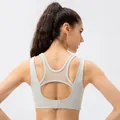 Back view of light grey yoga bra featuring mesh splicing and adjustable hook closure - S / Apricot Grey