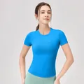 Nauwsluitend lichtblauw yoga t-shirt met ronde hals en ademende stof voor fitness - S / Koningsblauw