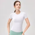 T-shirt sportiva bianca slim fit a girocollo da donna con leggings verde menta - Bianco