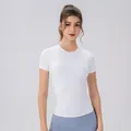 Wit nauwsluitend yoga T-shirt met borstpads voor dames fitness en hardlopen sport - S / Wit