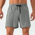 Pantaloncini sportivi grigi da uomo con coulisse in vita e spacchetti laterali tecnici - Grigio Piombo
