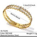 Sparkling 18K gold stainless steel wavy bangle with double row pavé zircons - Double Row Wave Intertwined Style (SS-YS292)