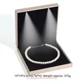 Champagne LED jewelry box for necklaces with black velvet interior and light - 19x19x4cm
