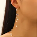 Long tassel drop earring with clear crystal beads and silver wire on female model - White K0429