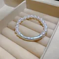 Elegant white pearl beaded bracelet with a silver-colored baroque-style irregular centerpiece - Bracelet-White