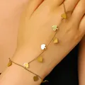 Minimalist gold alloy finger bracelet featuring delicate heart pendants on a fine chain. - 53 Titanium 9878 (heart)