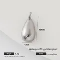 Detailed view of teardrop stainless steel pendant measuring 15mm by 7mm and weighing 1.3g - Medium Water Drop Piece (006)