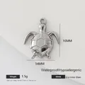 Macro shot of silver turtle pendant with dimensions 16mm x 14mm in stainless steel - Sea Turtle Piece (004)