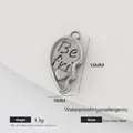 Macro detail of half-heart puzzle charm in stainless steel with size and weight specs - Right Heart Puzzle Piece (002)