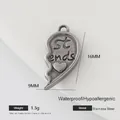 Macro view of 16mm stainless steel jigsaw heart charm with Best Friends engraving - Left Heart Puzzle Piece (001)