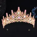 Detailed close-up of golden bridal crown with pink rhinestones and teardrop gems - Gold Pink AB Stone