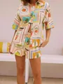 Detail van een zomerse tweedelige set met fruitprint op ademende crèmekleurige stof - XS / Off-White Fruitstijl (HA-DXCSTZ-013)
