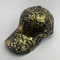 Gorra de béisbol de algodón negro con motivos de graffiti dorados y letras hip-hop - Grafiti Negro Oro