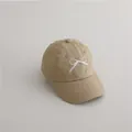 Khaki children's baseball cap featuring a delicate white bow embroidery for a sweet look - 2-8 Years / Khaki