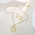 Golden irregular oval ring jewelry set with necklace and earrings on white surface - Irregular Oval Ring Style (E4286-2)