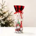 Detail of Christmas gnome wine bottle gift bag with linen texture and drawstring closure - Striped Hat Gnome Style