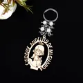 Detail of wooden angel keychain with Spanish prayer engraving and white bead charms - Angel Girl White