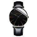 Minimalist black quartz watch with leather strap and rose gold markers on dark dial - Rose Gold Hands Black Case Black Leather Strap