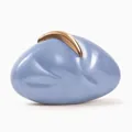 Artistic marble blue acrylic evening clutch bag with golden crescent clasp on white background - Blue