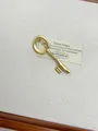 Minimalist gold-plated key brooch with matte brushed texture on rustic linen - Brushed Texture Key Shape (XZ0127A) / Gold