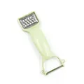Light green dual-head vegetable peeler and grater with stainless steel blades for potatoes - Apple Green