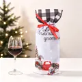 Close-up of Merry Christmas gnomes wine bottle cover with plaid drawstring and linen texture - Red Car Gnome