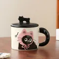 White ceramic cat mug with pink hood cat pattern and black moon-shaped handle - Pink Cat