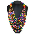 Handmade bohemian multilayer colorful wooden bead necklace for women on black mannequin - Colorful