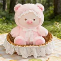Pink plush pig-bear stuffed toy in a picnic basket on grass with a lace bow detail - Worry-free Pig 32cm / Price And Color Are Random For Single Pieces Around 40cm In Length.