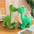Green plush dinosaur toy with yellow crown on head and soft textured fabric - Pea Dinosaur 35 Cm / Price And Color Are Random For Single Pieces Around 40cm In Length.