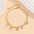 Detailed macro view of gold titanium steel bracelet with five colorful crystal pendants - Colorful Faceted Crystal Pendant Style (JL-005)