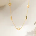 Elegant gold titanium steel necklace featuring hollow clover charms and beads - Hollow Flower Beads (XKN0291)