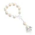 Close-up of heart-shaped rosary beads with rose motifs and angel wing charm detail - Cream White Silver Wings / Off White
