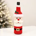 Close-up of Santa Claus knitted wine bottle cover with belt and beard decorations - Santa Claus Style