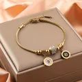 18K vergulde slangenketting armband met Romeinse cijfer hangers en sprankelende kristallen - Schijf met Romeinse cijfers / Goud