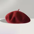 Detailed close-up of wine red wool beret showing premium thick felt texture and top tab - One Size (56-59cm) / Burgundy