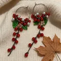 2605063 Red Crystal Tassel Beaded Earrings
