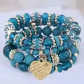 Détail de l'ensemble de bracelets bohème en perles de cristal bleu avec pendentif coeur - Vert